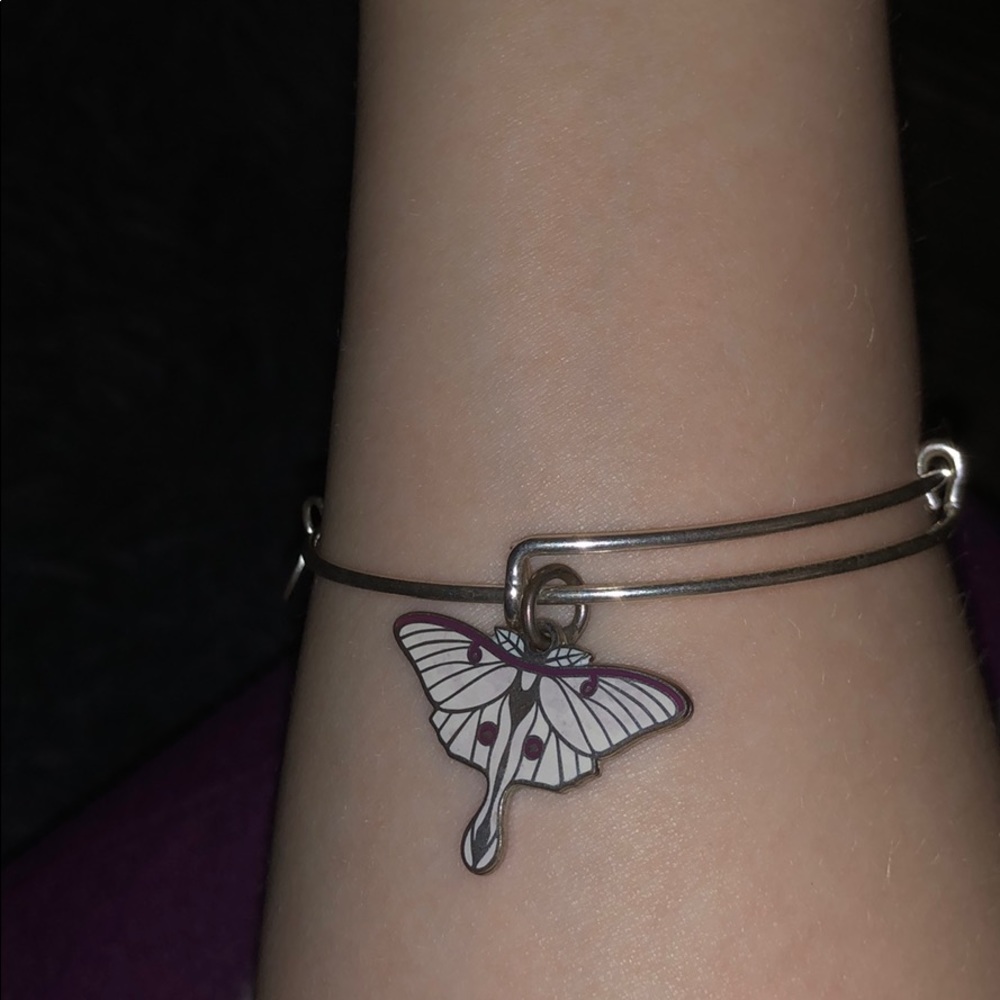 It’s a silver Alex and Ani butterfly Bengal